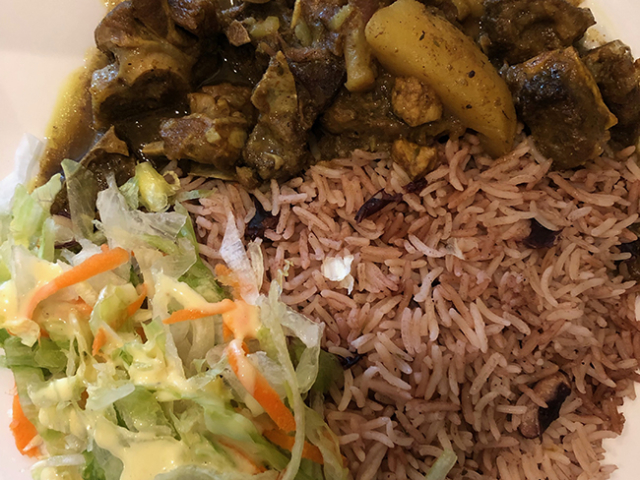 Curry goat with rice