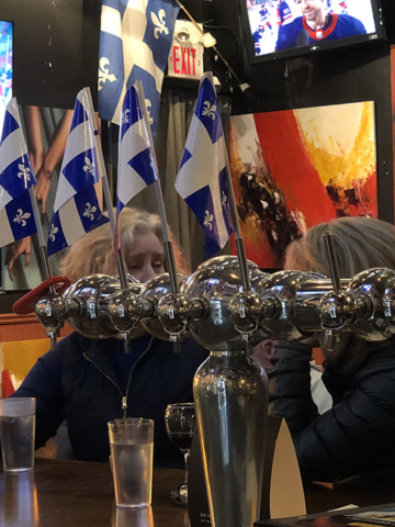 Frenchies diner with Quebec flags